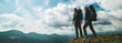 The couple standing on the mountain with the picturesque cloudscape