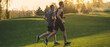 © realstock1 - The two sportsmen running on the grass in the park