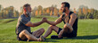 © realstock1 - The old and young sportsmen handshaking on the grass