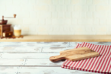 Wall Mural - Empty wooden  table with cutting board over kitchen shelf background.  Interior mock up for design and product display.