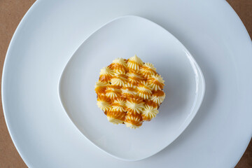 Carrot cake on white plate