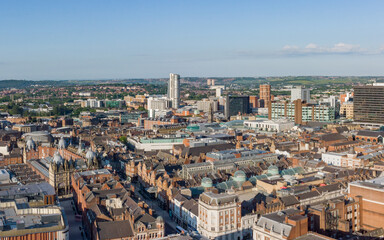 Wall Mural - Leeds City Centre in Yorkshire. Aerial view of the retail shopping area, offices and hotels looking south on a sunny day to Bridgewater place and the train station. 