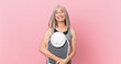 © kues1 - middle age white hair woman holding a weight scale. fitness and diet concept