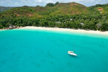 Wall Mural - Aerial view of a luxury yacht vacation. Nature background. Praslin island, Seychelles