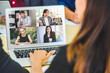 © totojang1977 - Business woman meeting by video conference with his team on laptop screen talking and discussion about financial. Working from home, Working remotely during covid-19 or corona virus crisis.