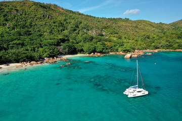 Wall Mural - Aerial view of a luxury yacht vacation. Nature background. Praslin island, Seychelles