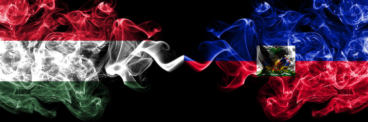 Hungary, Hungarian vs Haiti smoky flags side by side.