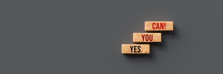 Wall Mural - cubes with message YES YOU CAN on grey background