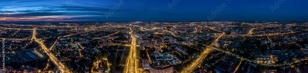 aerial panoramic cityscape with illuminated streets and buildings at night. Minsk, Belarus. - obrazy, fototapety, plakaty 