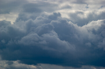 Wall Mural - thunderclouds in the sky on a spring day