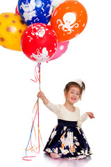 Lovely girl with colorful balloons