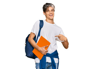 Poster - Young hispanic man wearing student backpack and holding books smiling happy pointing with hand and finger