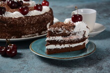 Black Forest Cake, Schwarzwald Pie, Dark Chocolate And Cherry Dessert . Black Forest Cake Decorated With Whipped Cream And Cherries.