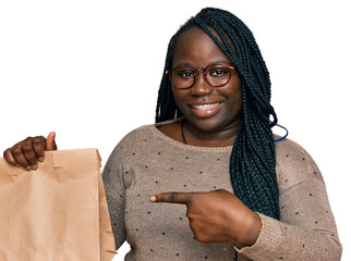 Poster - Young black woman with braids holding take away paper bag smiling happy pointing with hand and finger