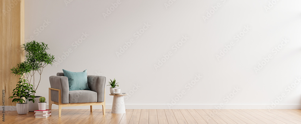 Living room interior room wall mockup in warm tones,gray armchair on wooden flooring. - obrazy, fototapety, plakaty 