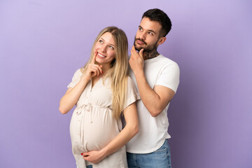 Wall Mural - Young couple pregnant and thinking