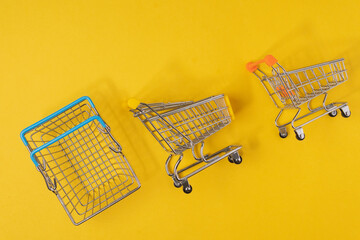 Empty basket on a yellow background. The concept of shopping and discounts on Black Friday.