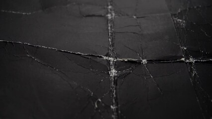 Wall Mural - Black folded wrinkled crumpled cracked cardboard. Opening and straightening the fold. Abstract ancient grunge paper material