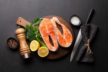 Canvas Print - Fresh raw salmon cooking. Fish steaks with herbs