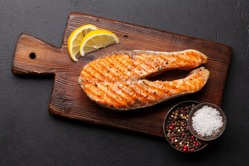 Sticker - Grilled salmon steak. Fish steak with herbs and spices