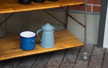 Wall Mural - Blue cups and pots on the shelf in the room