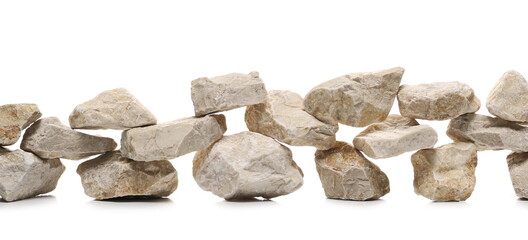 Canvas Print - Rocks, stone pile arranged as fence isolated on white background