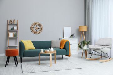 Sticker - Modern living room interior with stylish comfortable sofa