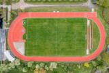 Fototapeta Nowy Jork - Aerial View of Soccer Field and Running Track