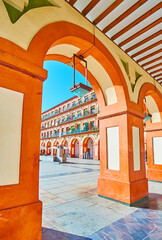 Canvas Print - The view through the arcade of Corredera Square, Cordoba, Spain