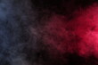 © Qwenergy - Artificial smoke in white-red light on a black background