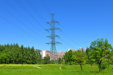 High-voltage power line in Mitino Landscape Park in summer. Moscow, Russia