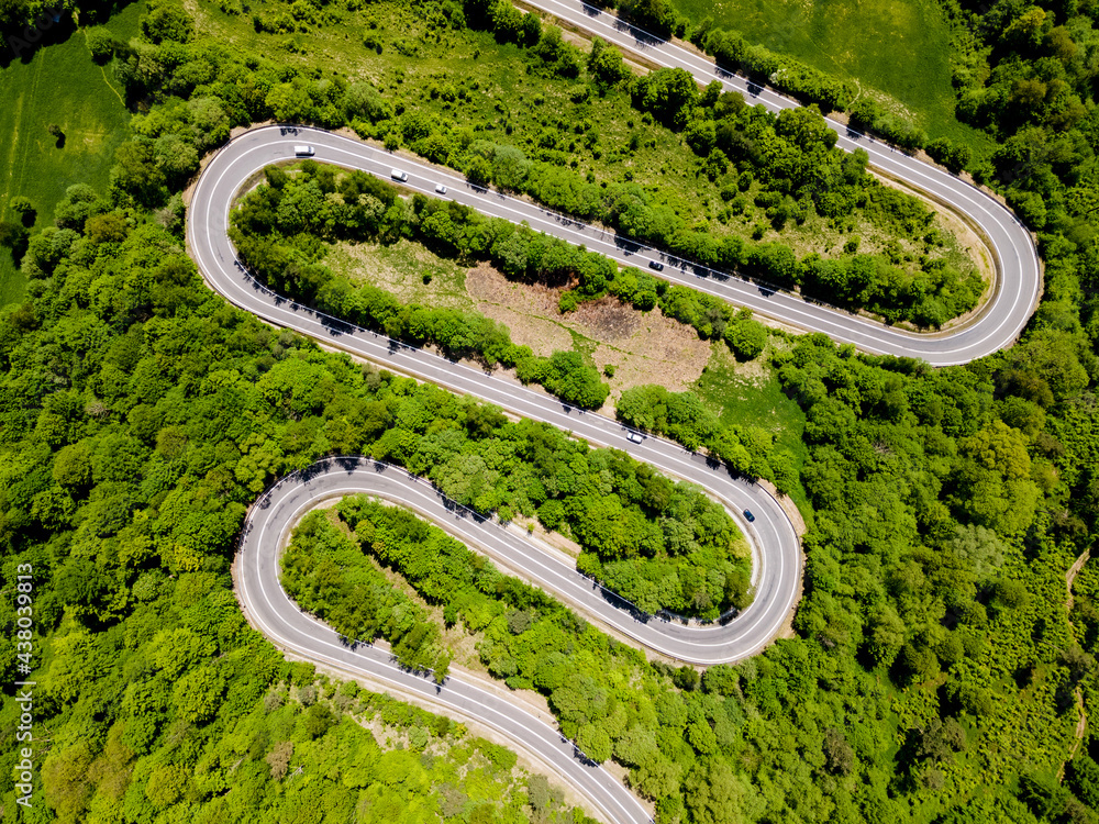 Mountain Pass Winding Road in Woodlands. Drone View - obrazy, fototapety, plakaty 