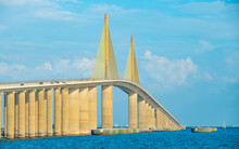 Sunshine Skyway Bridge Spanning The Lower Tampa Bay And Connecting Terra Ceia To St. Petersburg, Florida, USA. Day Photo. Ocean Or Gulf Of Mexico Seascape. Reinforced Concrete Bridge Structure.