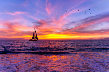 Wall Mural - Sunset Sailboat Inspirational Landscape