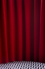 Wall Mural - Twin peaks scene with red velvet curtain and black and white tile on floor, vertical. Theatre blank stage for presentation.