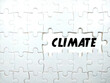 © Mohd Azrin - Selective focus.Text CLIMATE with jigsaw puzzle on white background.