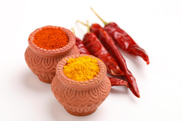 Wall Mural - Red chili powder and turmeric powder in bowl