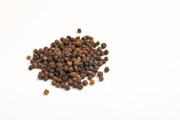 Wall Mural - Black pepper seed on white background.