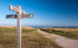 The South Downs Way, England. A sign giving directions to the popular 100 mile hiking route between Winchester and Eastbourne on the south coast.