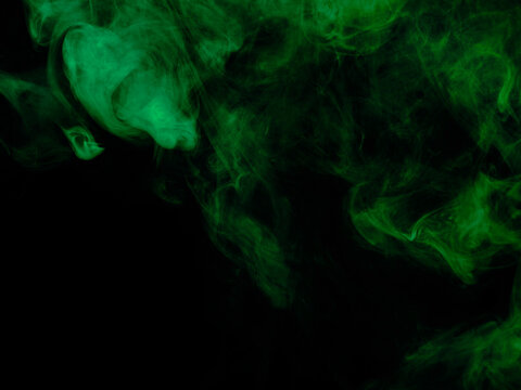 Fototapete - Green smoke texture on black background