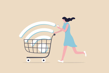 Mobile online shopping, app or website e-commerce website easy to buy and purchase products concept, happy young woman using mobile e-commerce app with big wifi sign in shopping cart trolley.