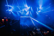© ADDICTIVE STOCK - Bright neon rays in dark concert hall