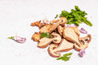 Dried mushrooms Boletus edulis (Penny bun, Cep, Porcini) on textured plaster background