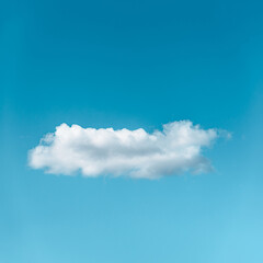 Lonely white cloud isolated on blue sky