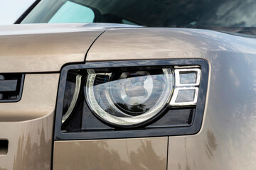 Close up of a new car's headlight