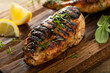 Balsamic grilled chicken breast on a board