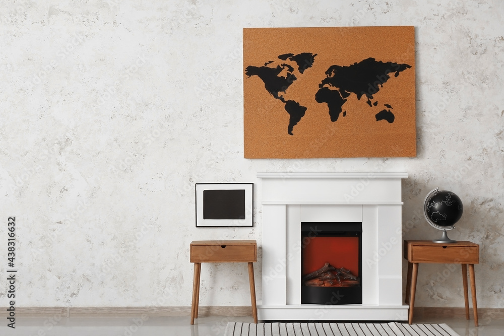 Stylish fireplace in interior of living room