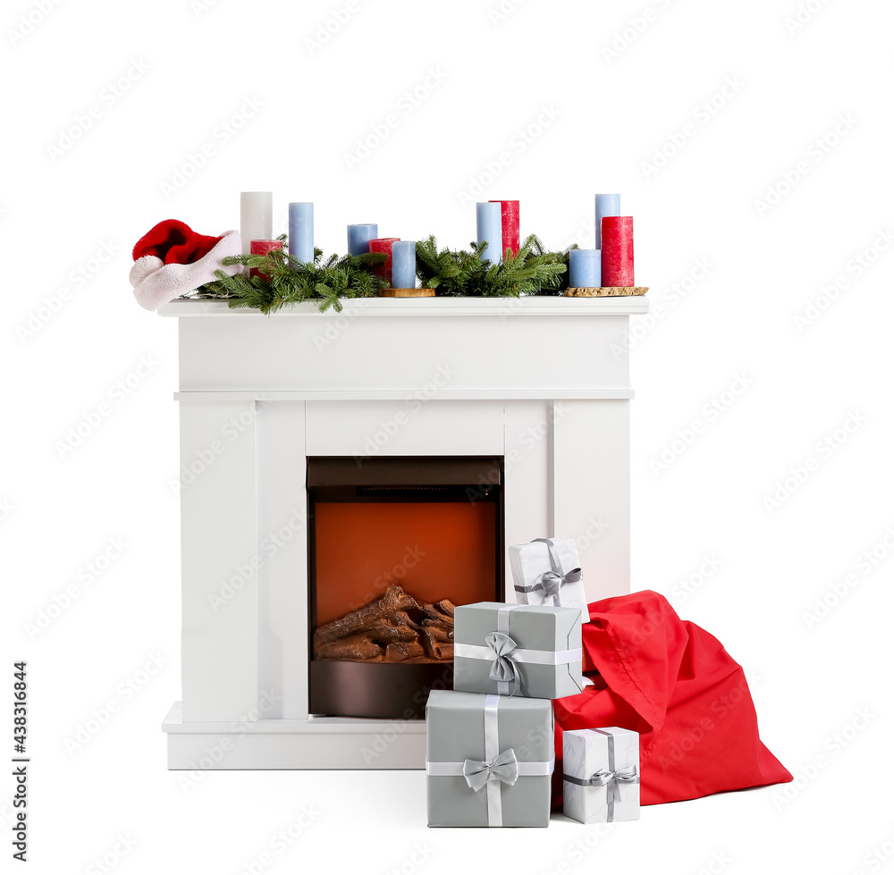 Fireplace decorated for Christmas on white background