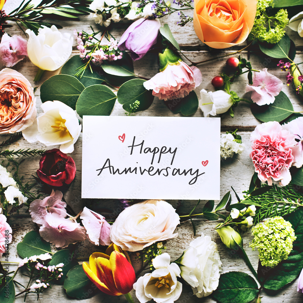 Happy Anniversary card and flowers Stock Photo | Adobe Stock