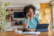 © bnenin - Adult African woman, making a phone call, during work.